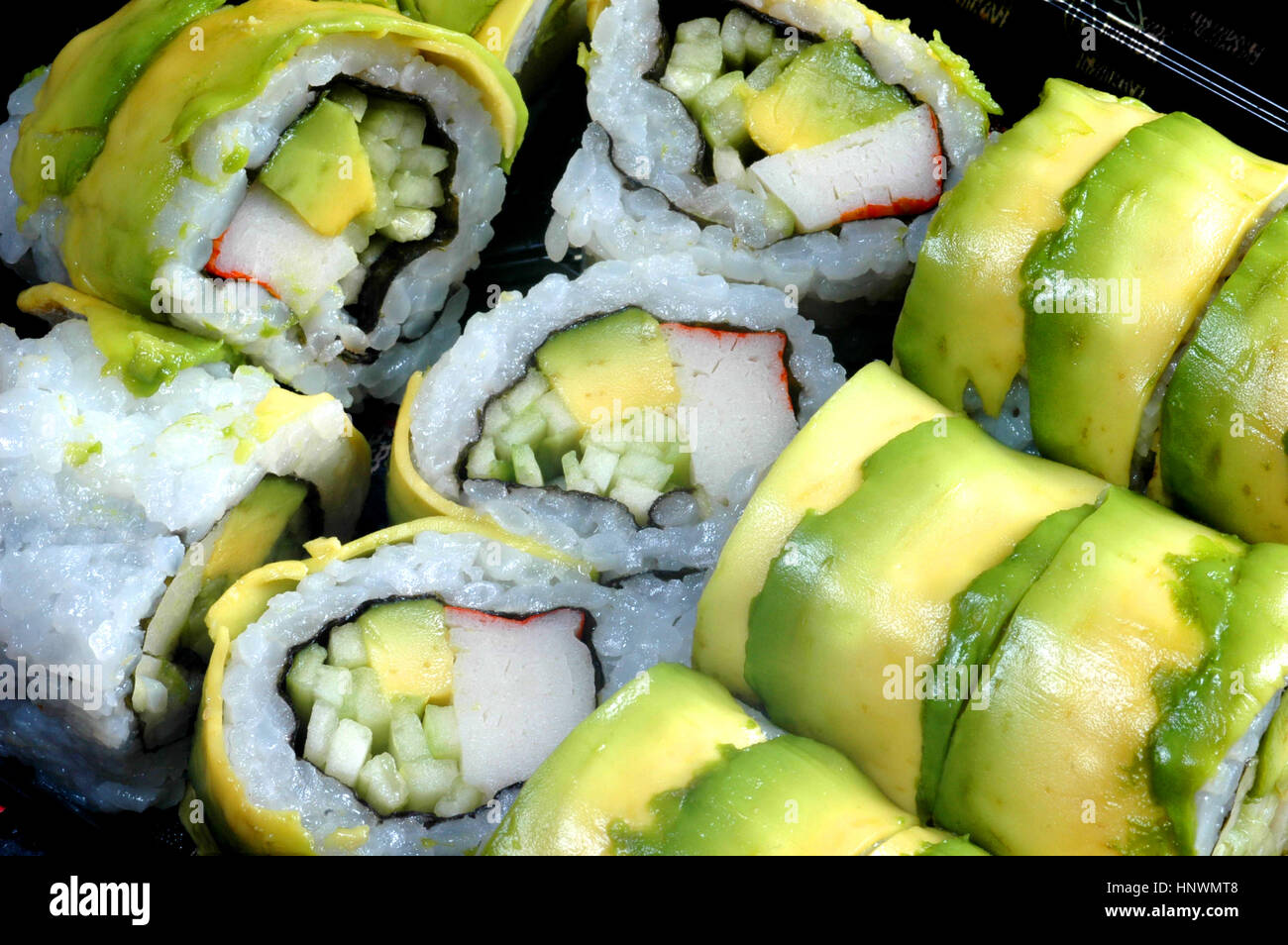 green avocado sushi roll close up Stock Photo