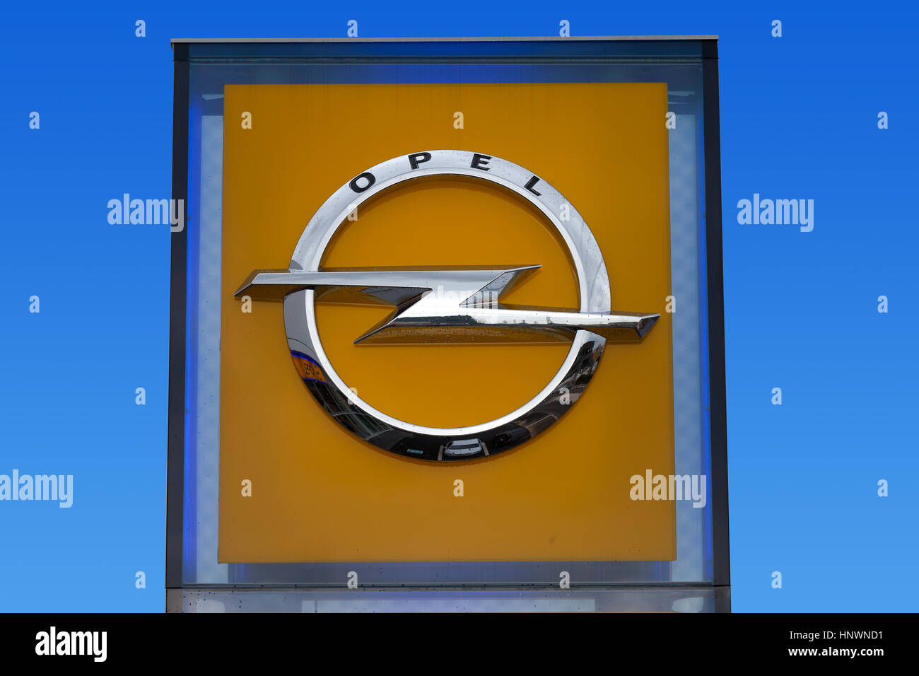 Opel sign at a local dealership. Opel is a German automobile manufacturer headquartered in Germany, subsidiary of the American group General Motors. Stock Photo
