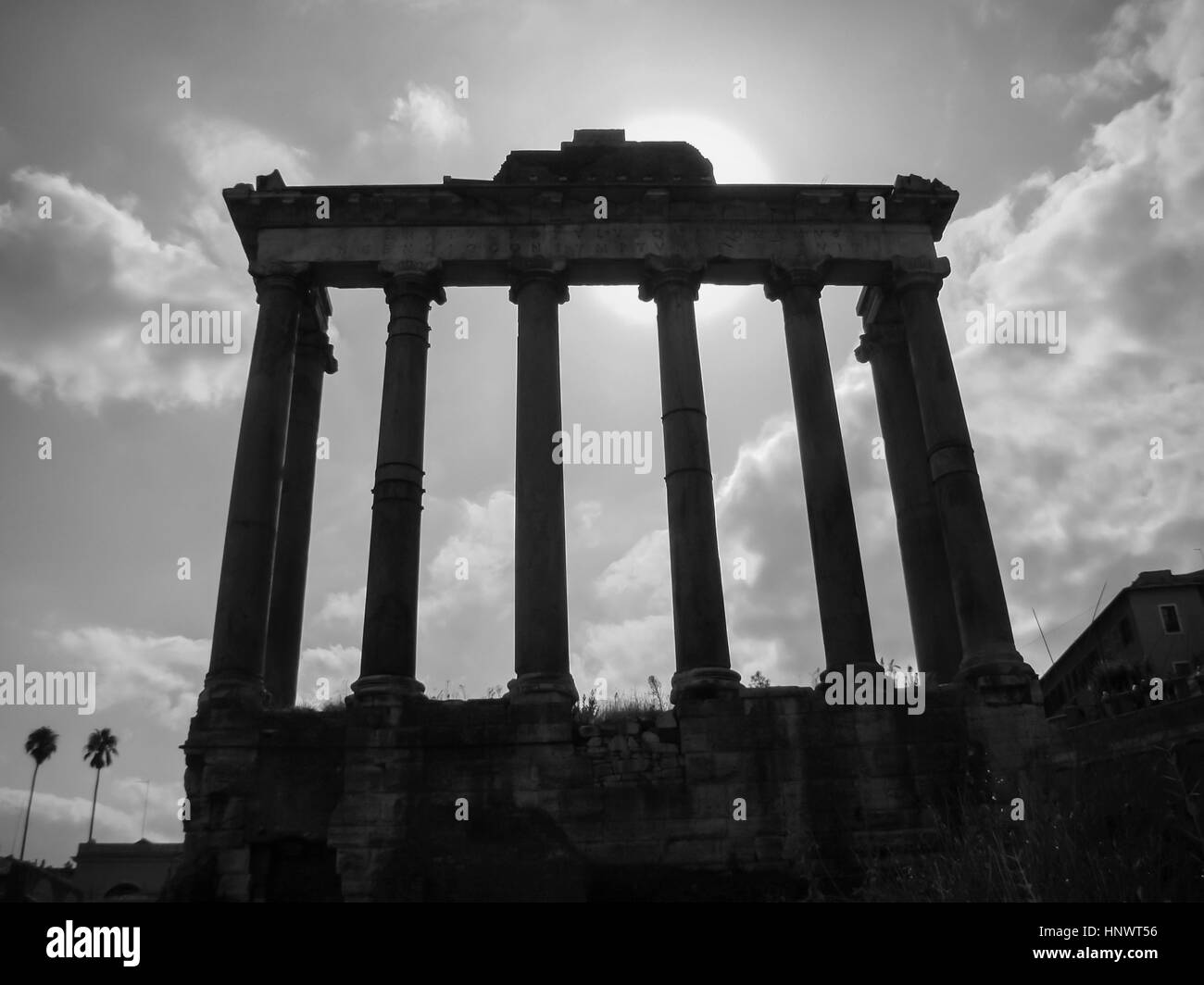 The remainings of the front part of  a roman antique temple at the Roman Forum in the city of Rome, Italy Stock Photo