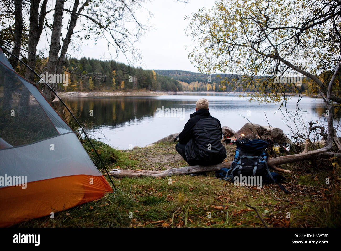 Rear view young male hiker hi-res stock photography and images - Alamy
