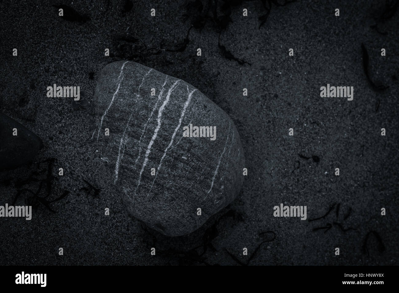 Rocks and sand Stock Photo - Alamy
