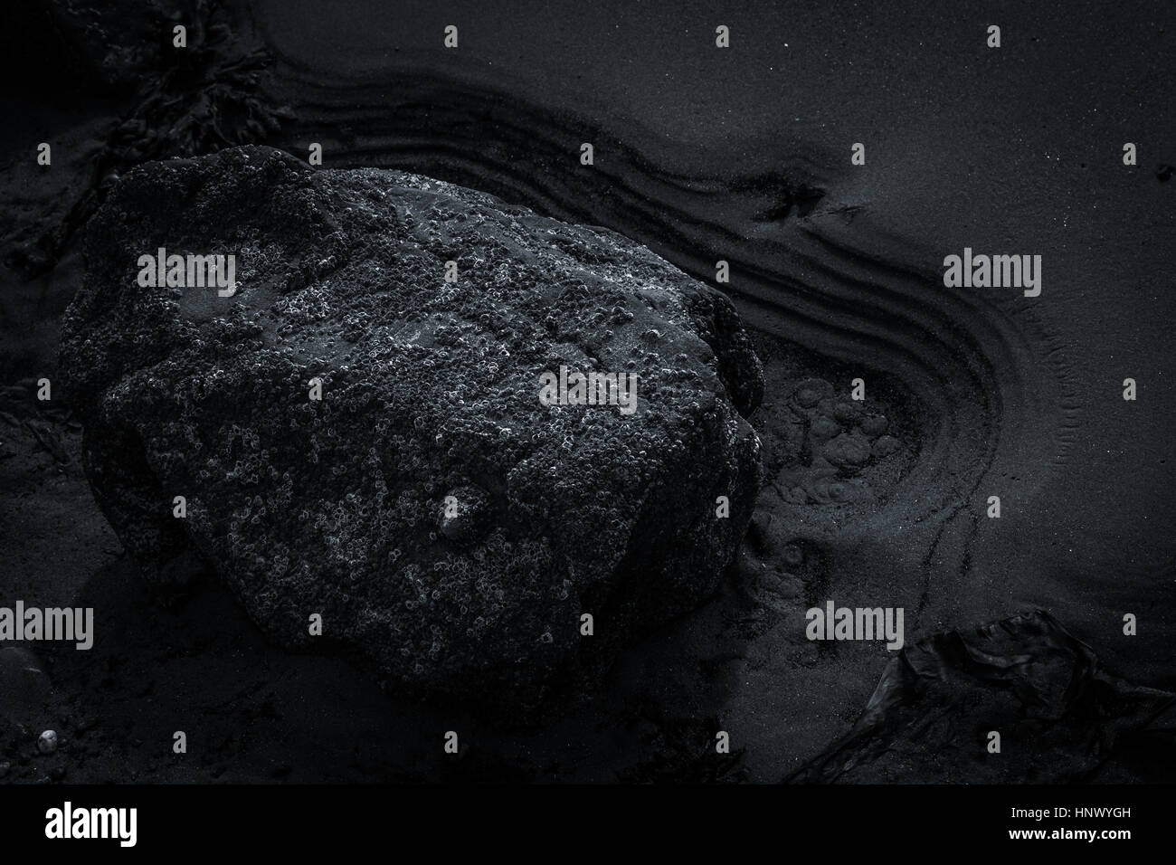 Rocks and sand Stock Photo - Alamy