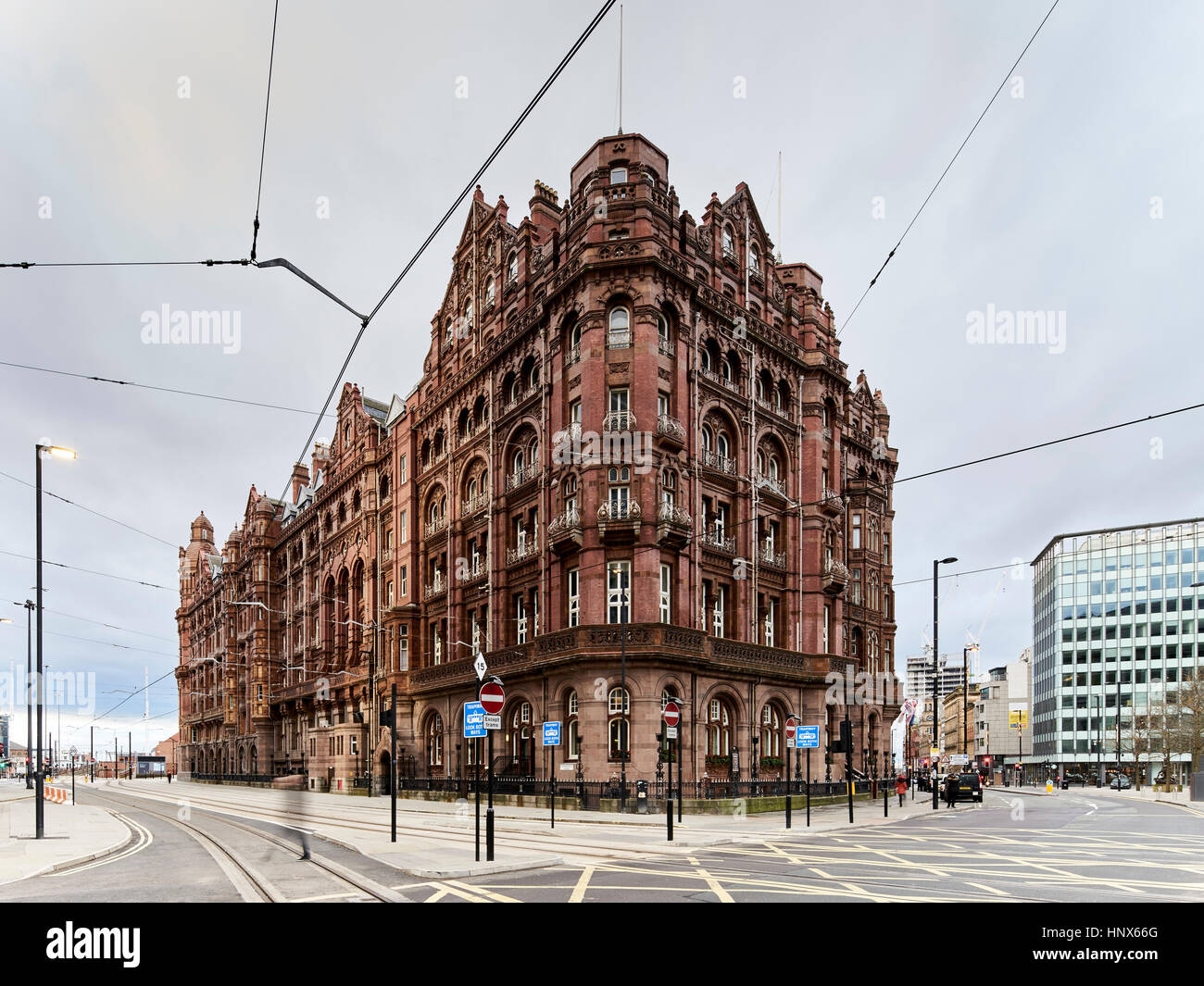 Cityscape with red brick hotel on corner site, Manchester, UK Stock Photo