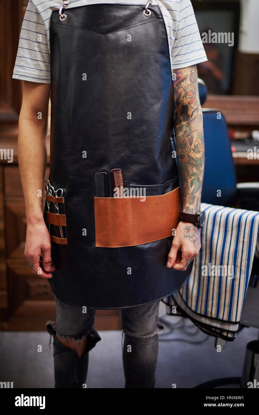 Hairdresser wearing apron Stock Photo Alamy