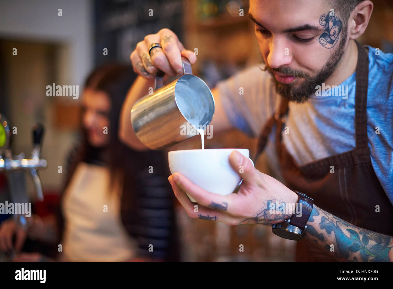 Barista making coffee Stock Photo