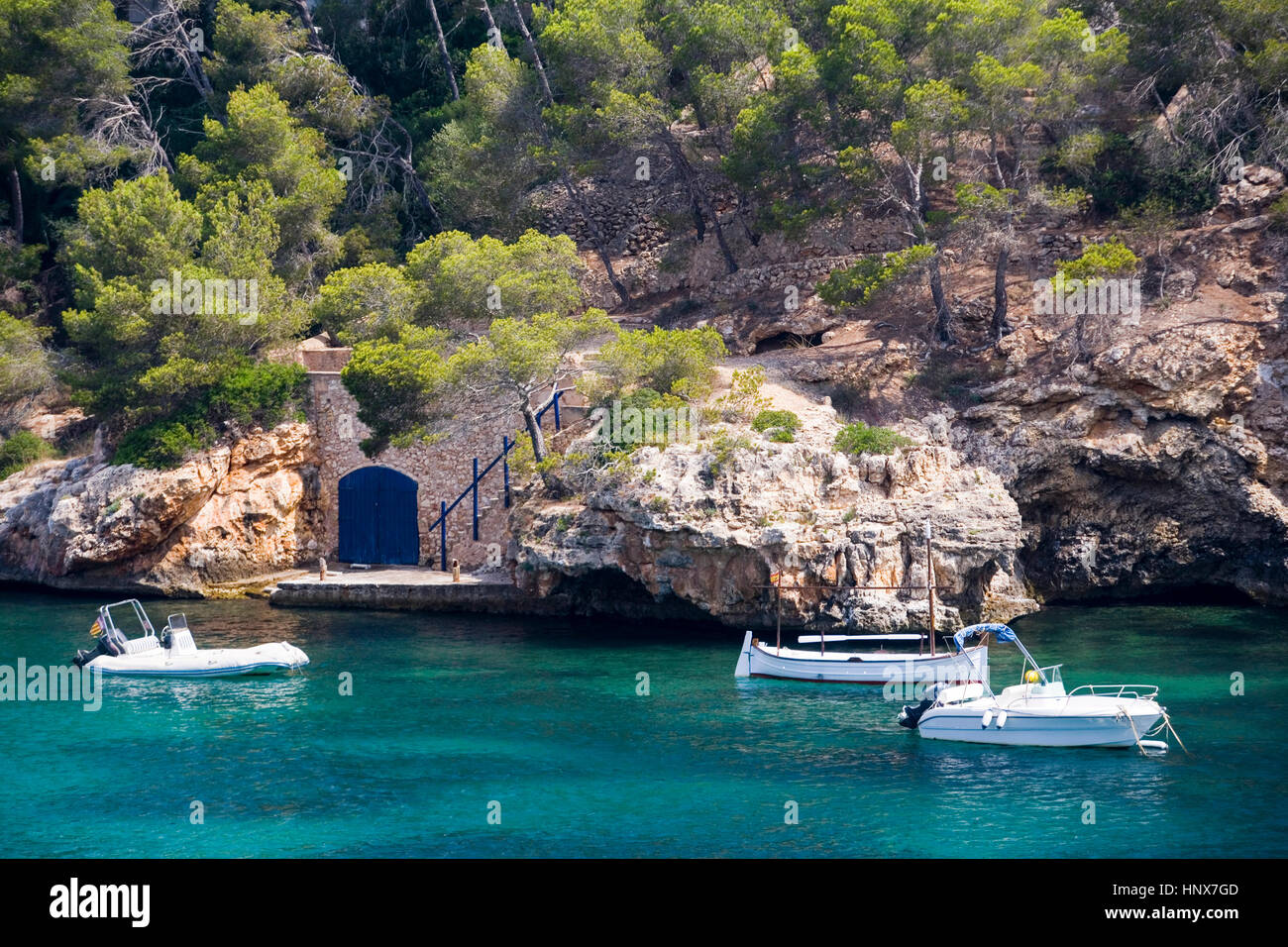 Motor boats moored off coast, Cala Figuera, Majorca bay, Spain Stock Photo