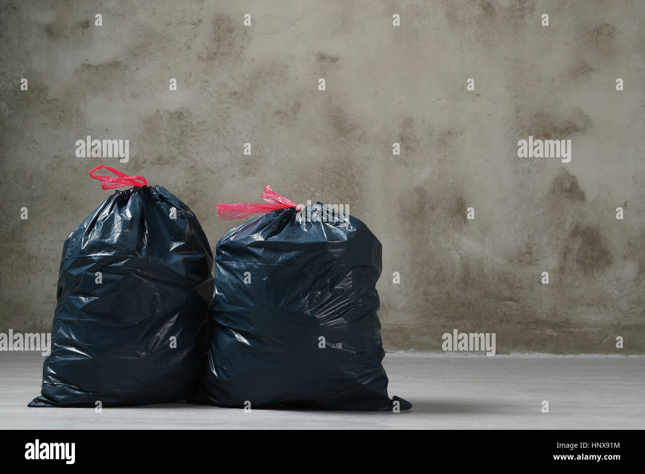 https://c8.alamy.com/comp/HNX91M/pollution-trash-bags-on-the-floor-HNX91M.jpg