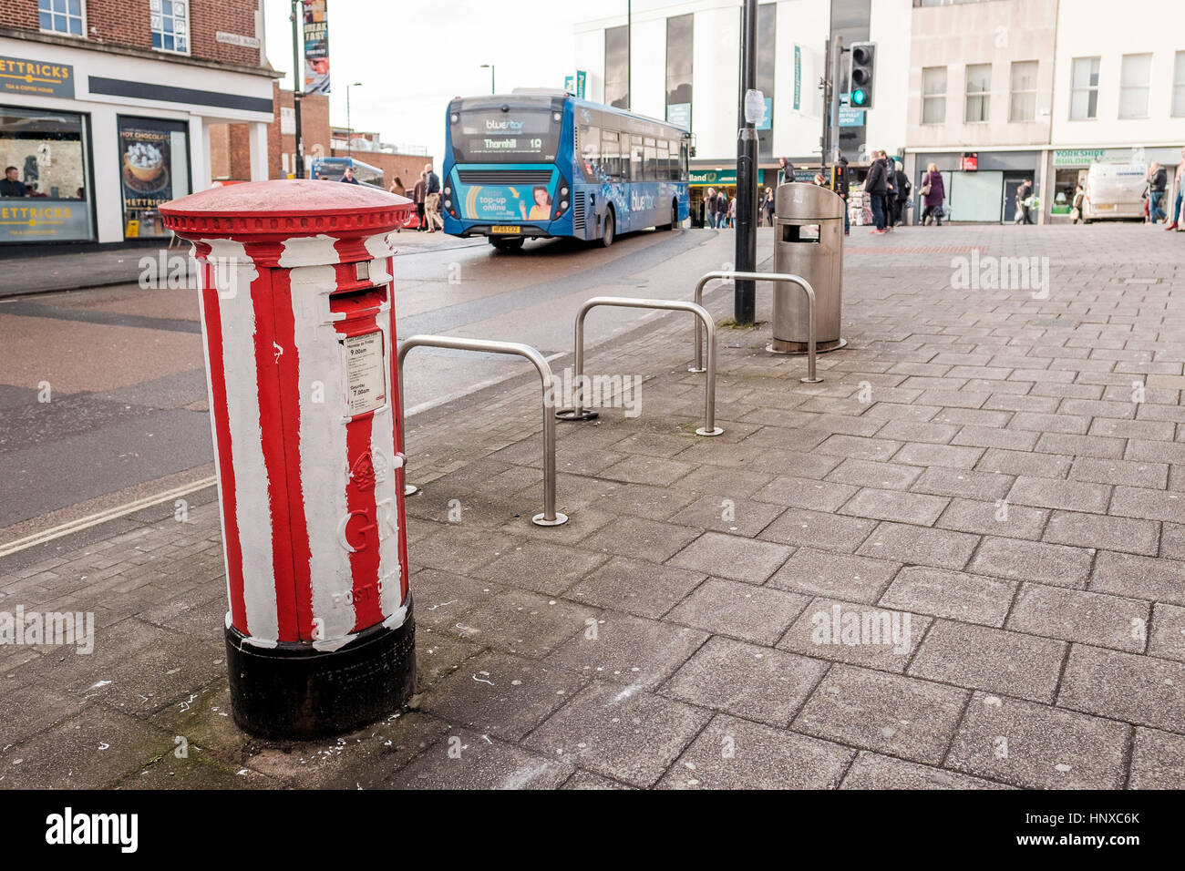 Southampton F.C. supporters paint white stripes on a Post Box after their club reaches the final of the EFL Cup, at Wembley, 2017 Stock Photo