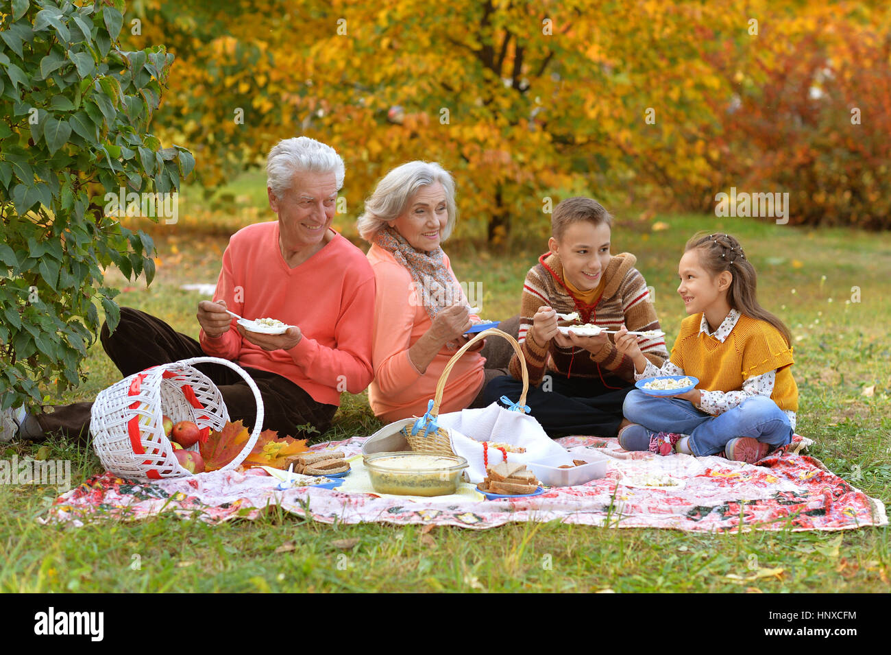 Cute happy family on picnic hi-res stock photography and images - Alamy