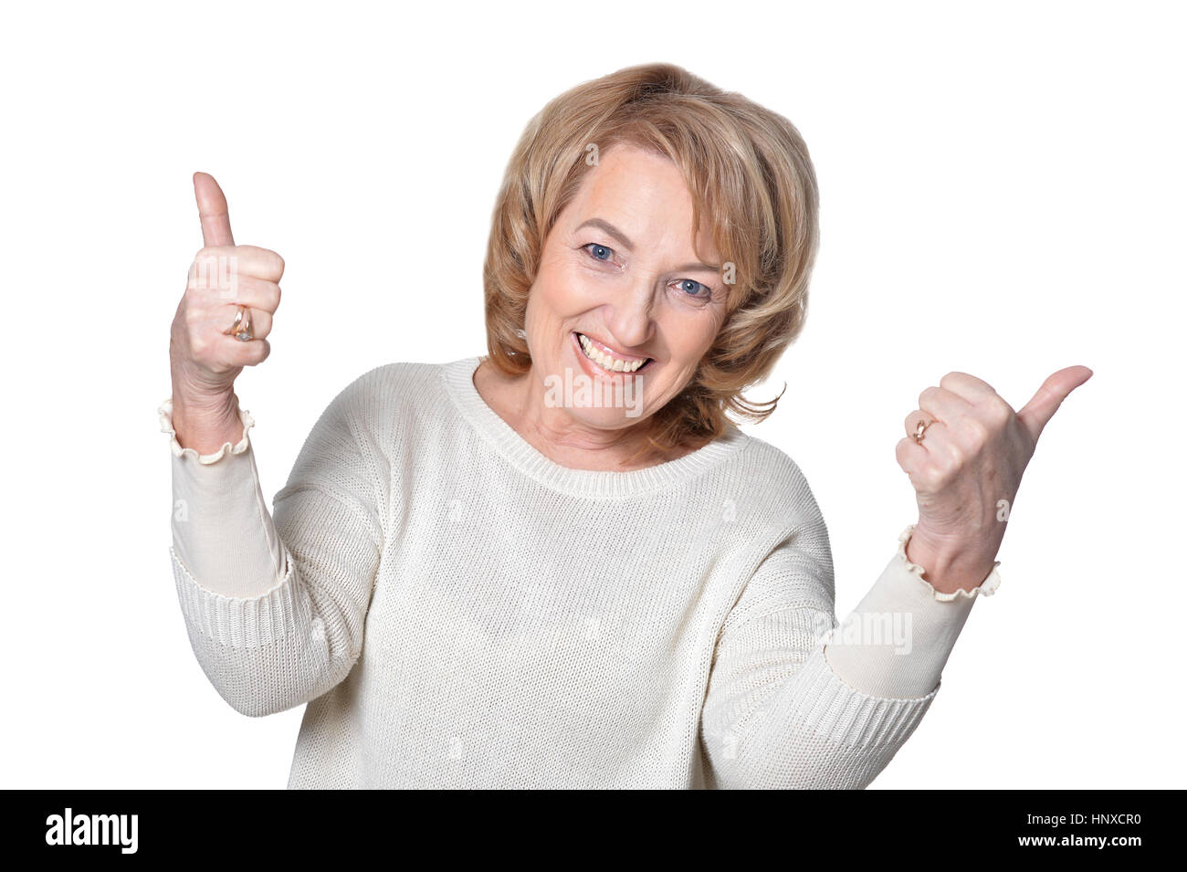 Senior woman with thumbs up Stock Photo - Alamy