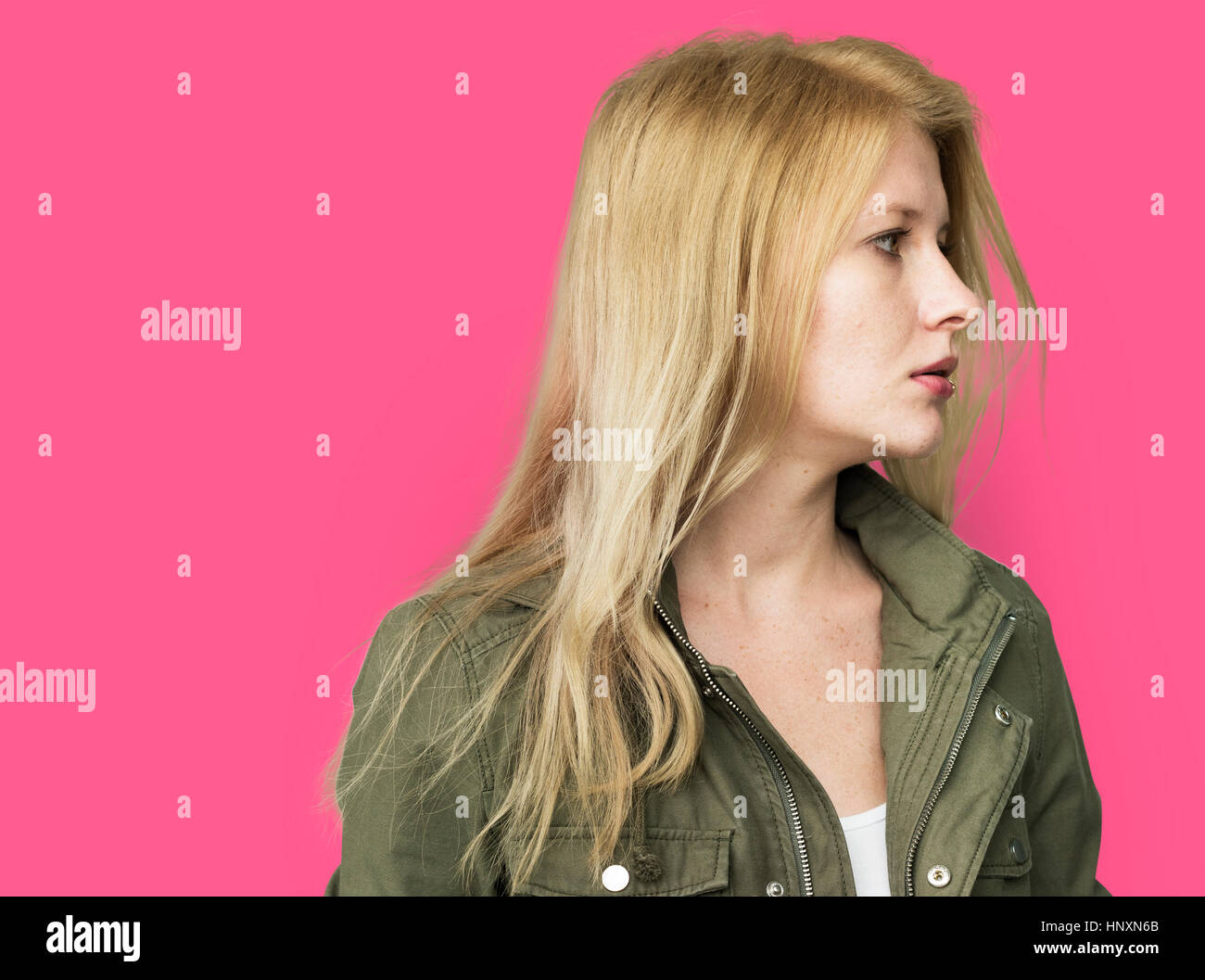 Blonde young woman studio portrait Stock Photo - Alamy