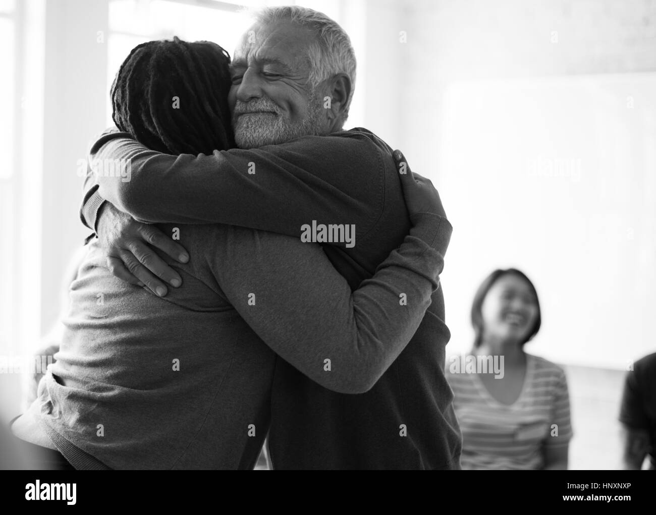 Group hug circle Black and White Stock Photos & Images - Alamy