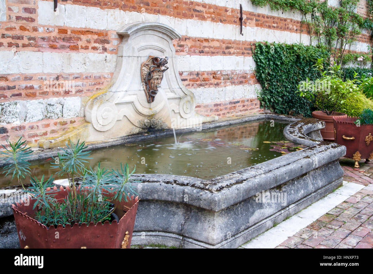 Fountain in Maizicourt Gardens (Les Jardins de Maizicourt), Somme, France (obligatory mention of the garden name) Stock Photo