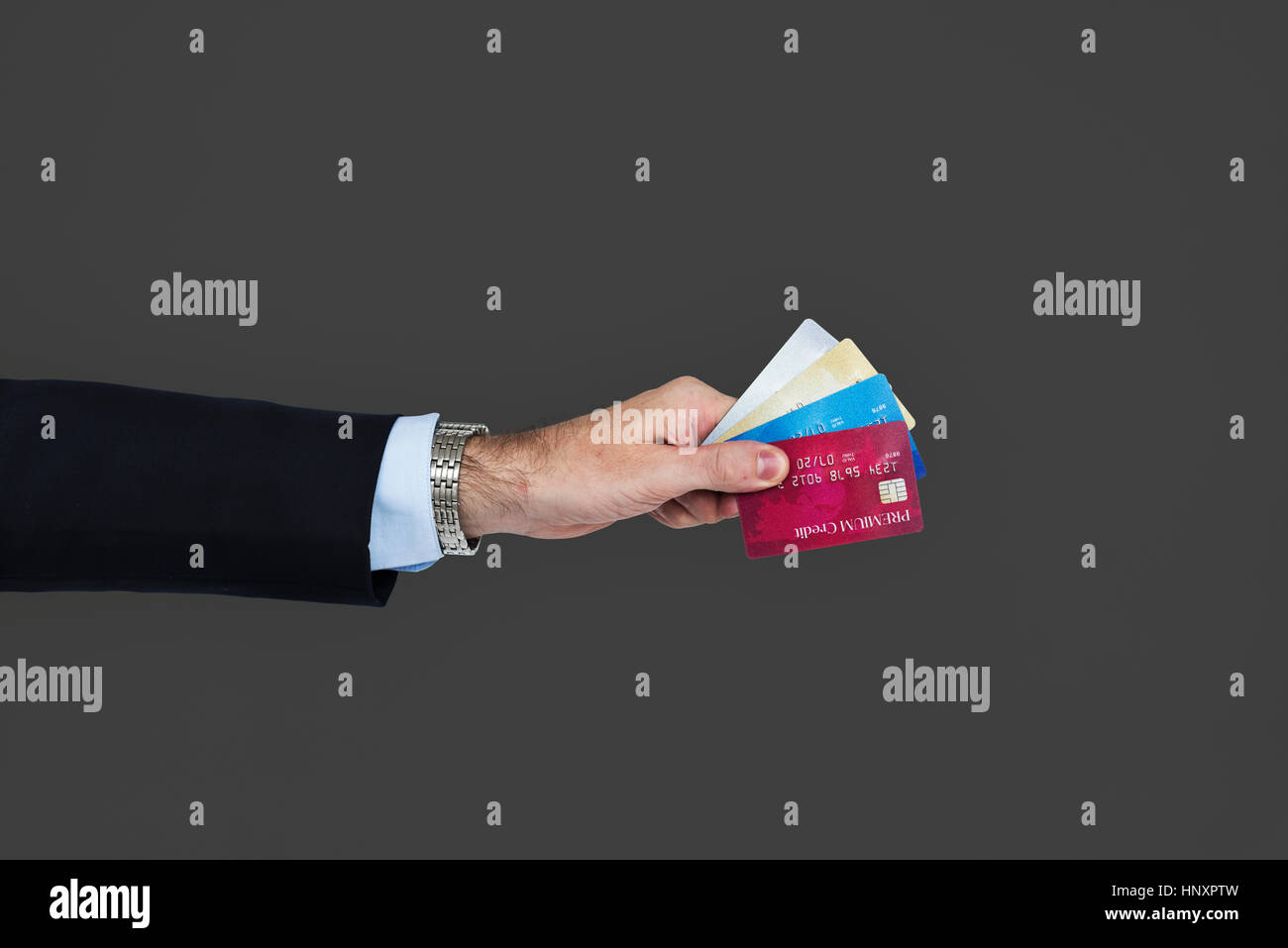Business Attire Hand Holding Credit Cards Stock Photo