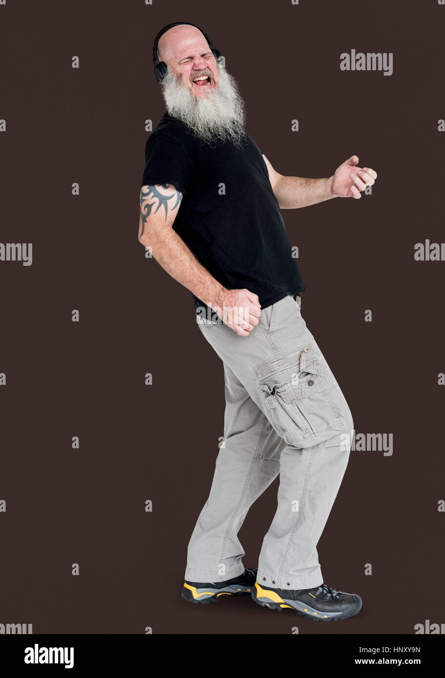Bearded rocker guy playing air guitar portrait Stock Photo - Alamy