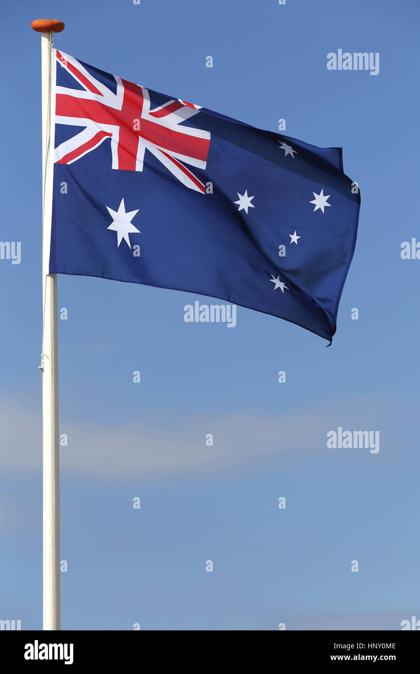 Australian flag flying in the wind Stock Photo
