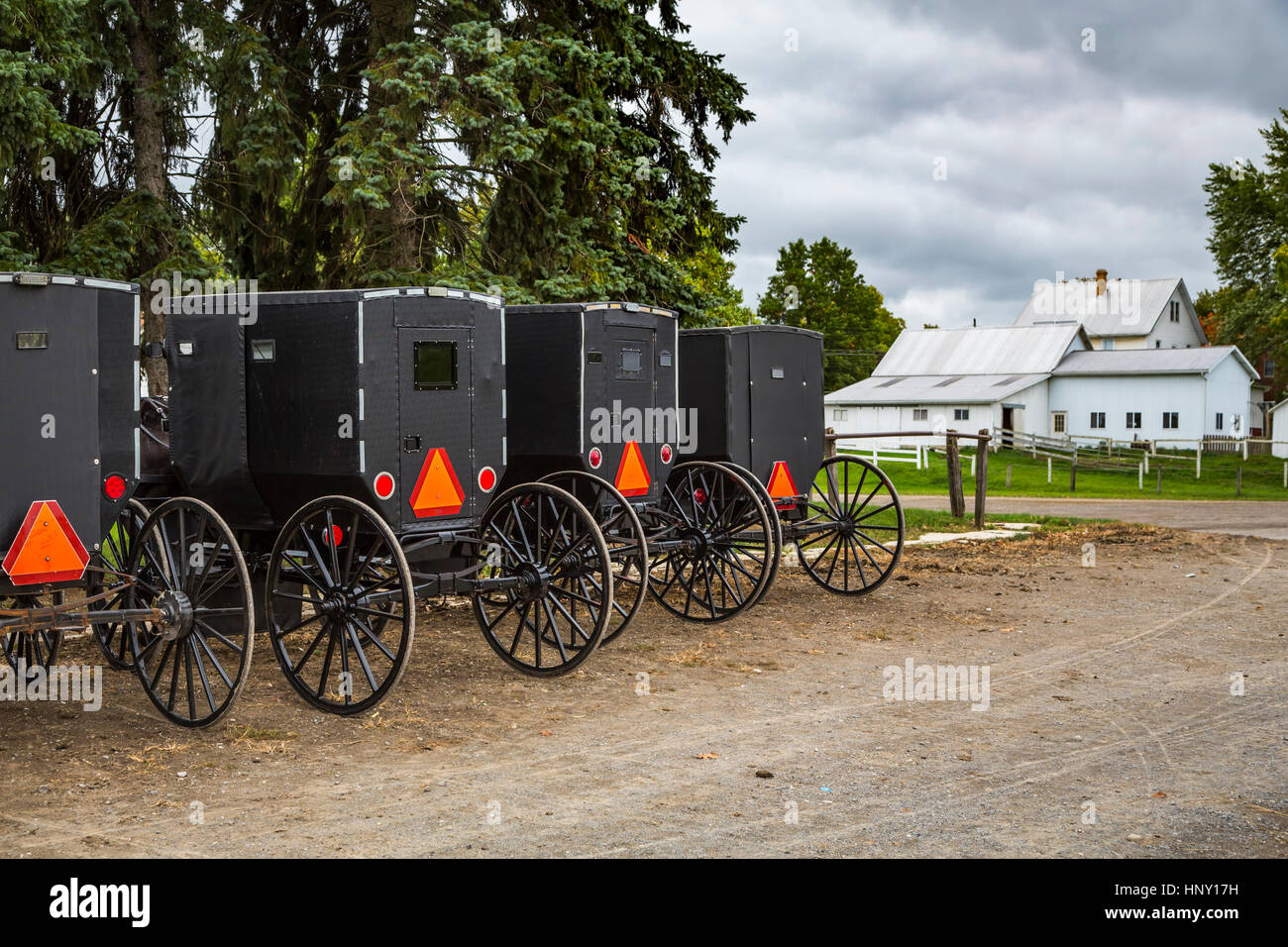 Amish buggies at a hitching post in Dalton, Ohio, USA. Stock Photo