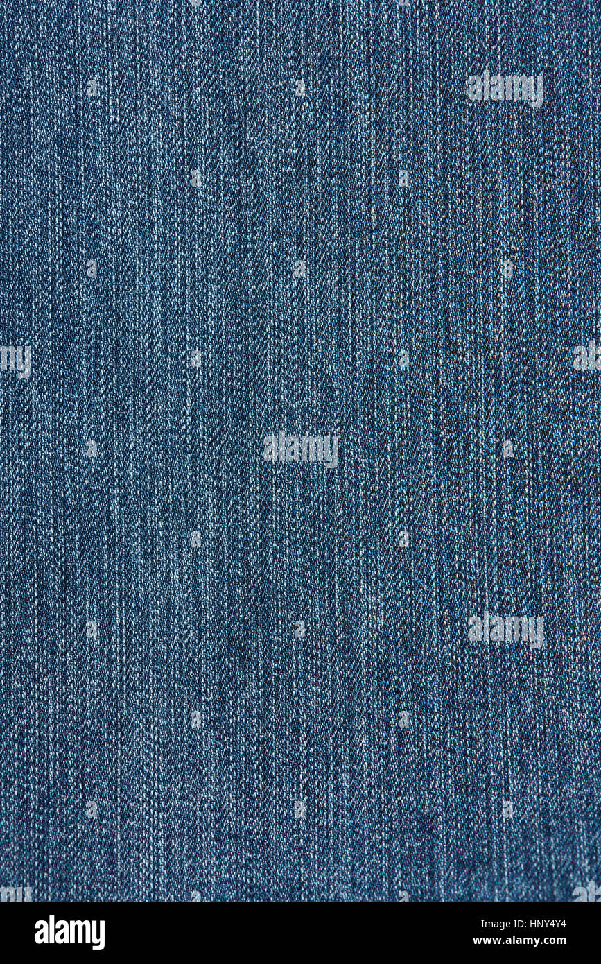Vertical dark blue jeans lines texture. Close up of jeans textile Stock Photo