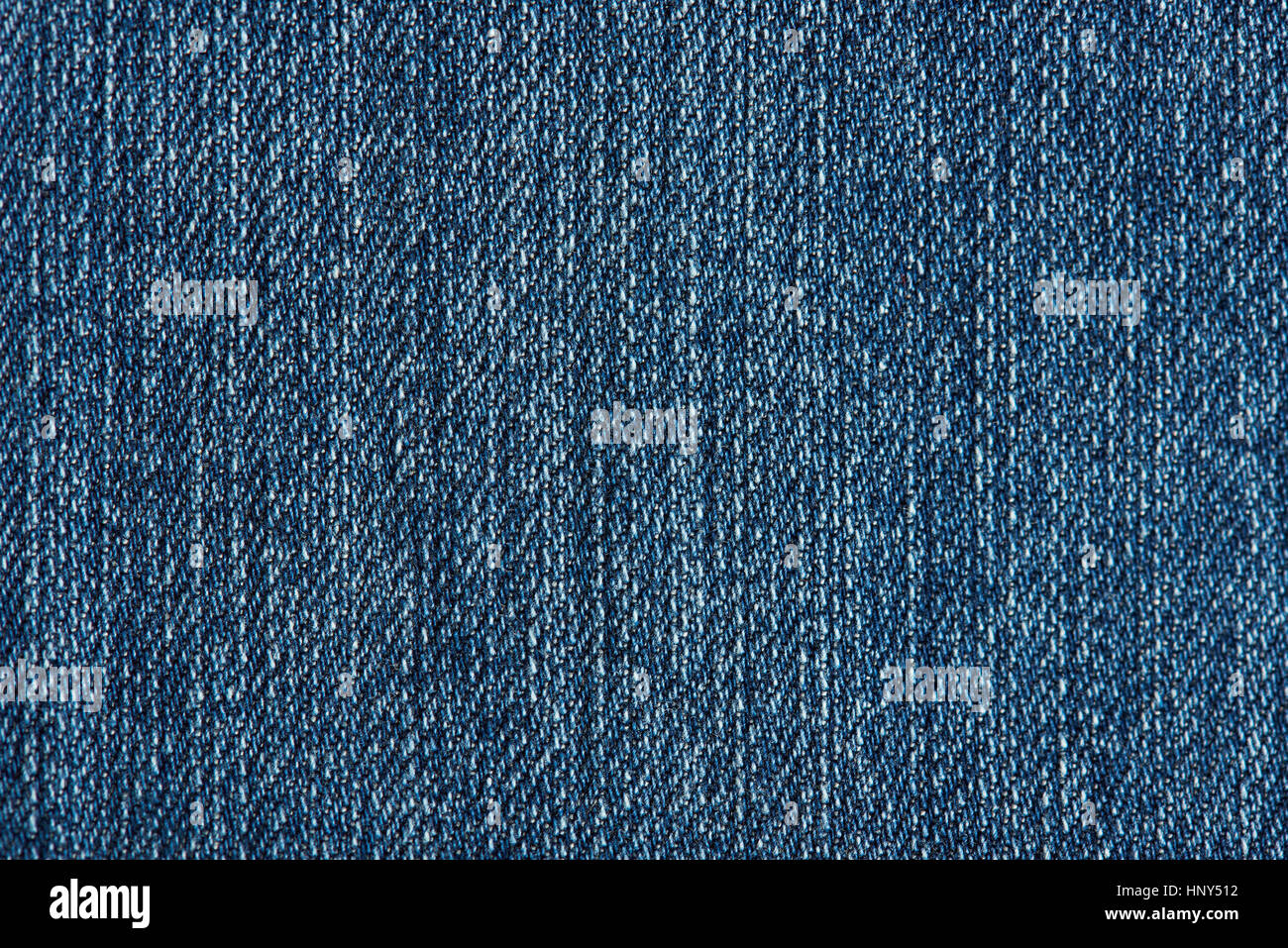 Texture of blue jeans fabric vertical lines. Pattern of blue jeans Stock Photo