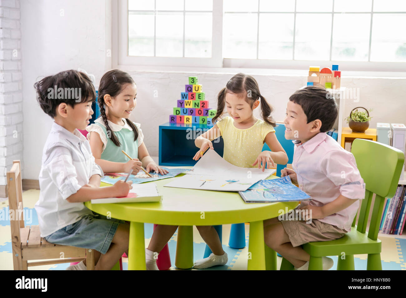 Kindergarten children at classroom Stock Photo Alamy