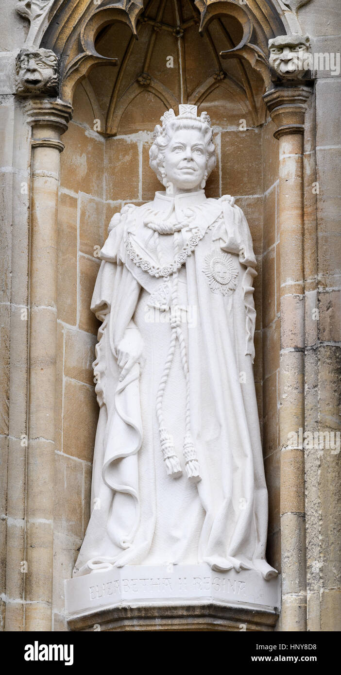 Statue of Queen Elizabeth II on an external wall at Canterbury