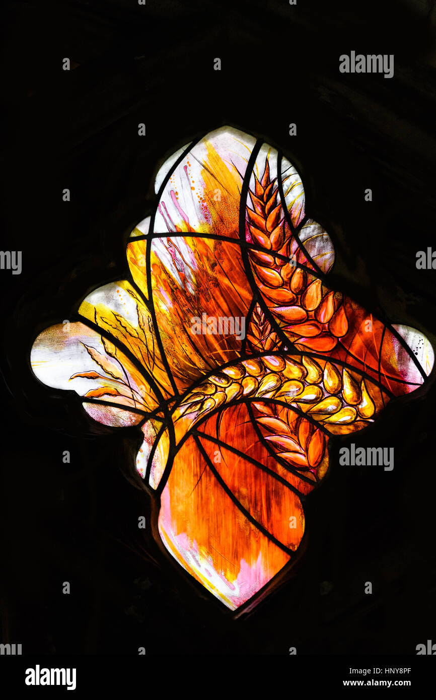 Modern stained glass window in the cloister at Canterbury cathedral, England. Stock Photo