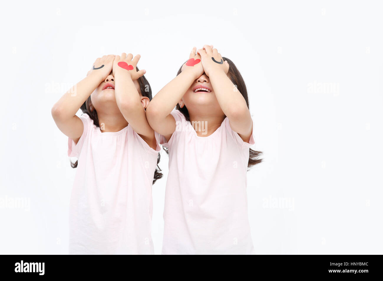 Smiling twin girls Stock Photo