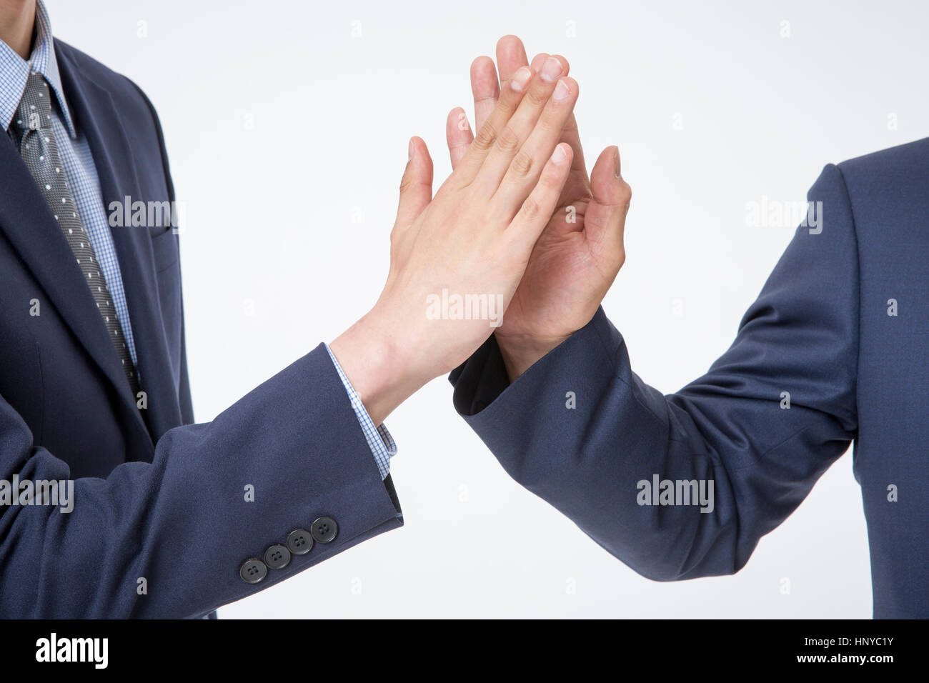 Teamwork of businessmen young and old Stock Photo