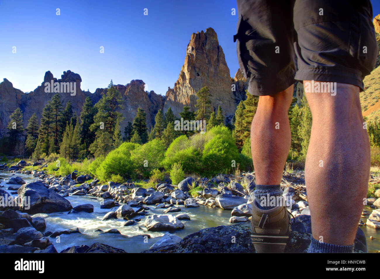 Hiker Near the Monument Rock Climbing Formation at Smith Rock State Park Outside Terrebonne Oregon Stock Photo