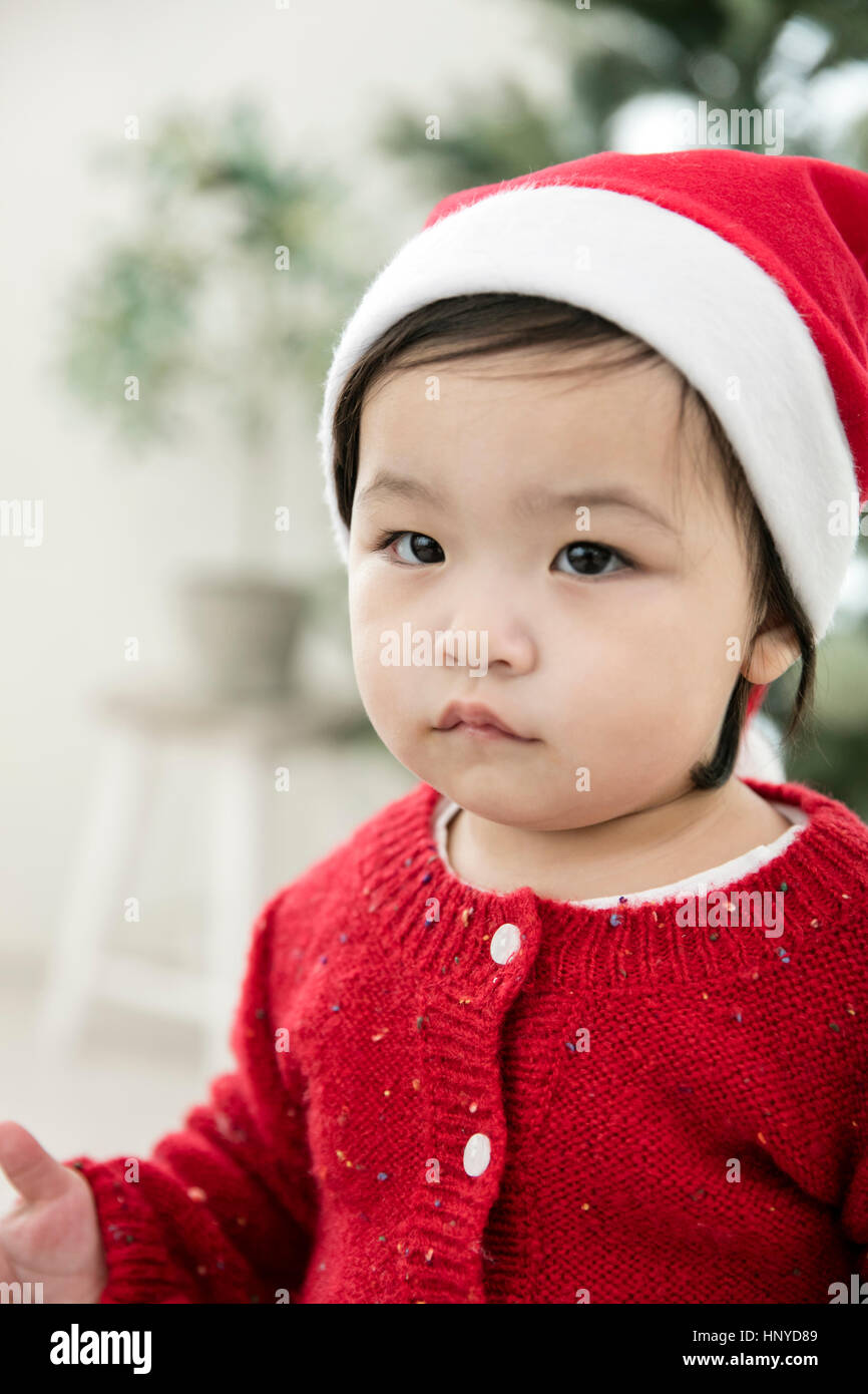 Portrait of baby girl in Christmas costume Stock Photo