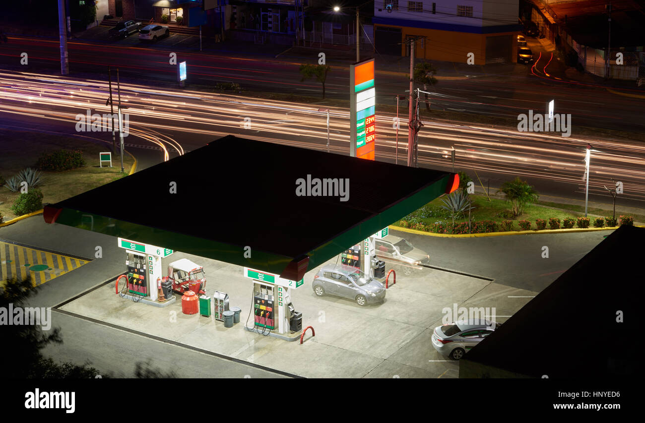 Highway with gas station at night light time Stock Photo