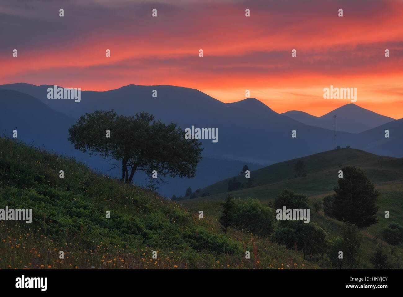 Ukraine. Carpathians. Dzembronya. Sunset sky in the mountains Kosarische Stock Photo