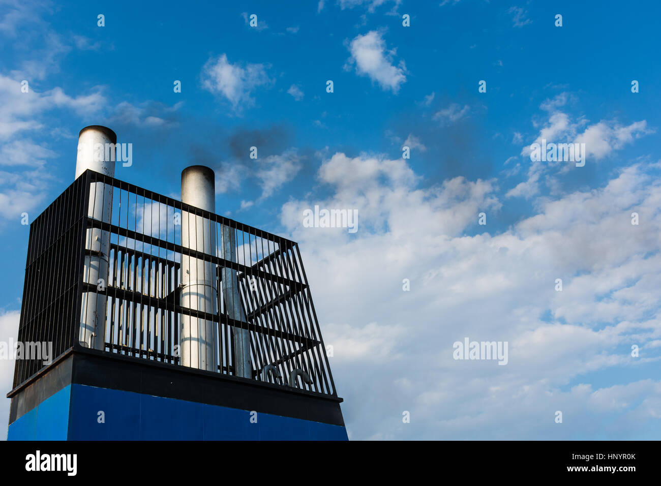 Aboard, chimney of a ferry or cruise ship, black smoke. Pollutes the ...