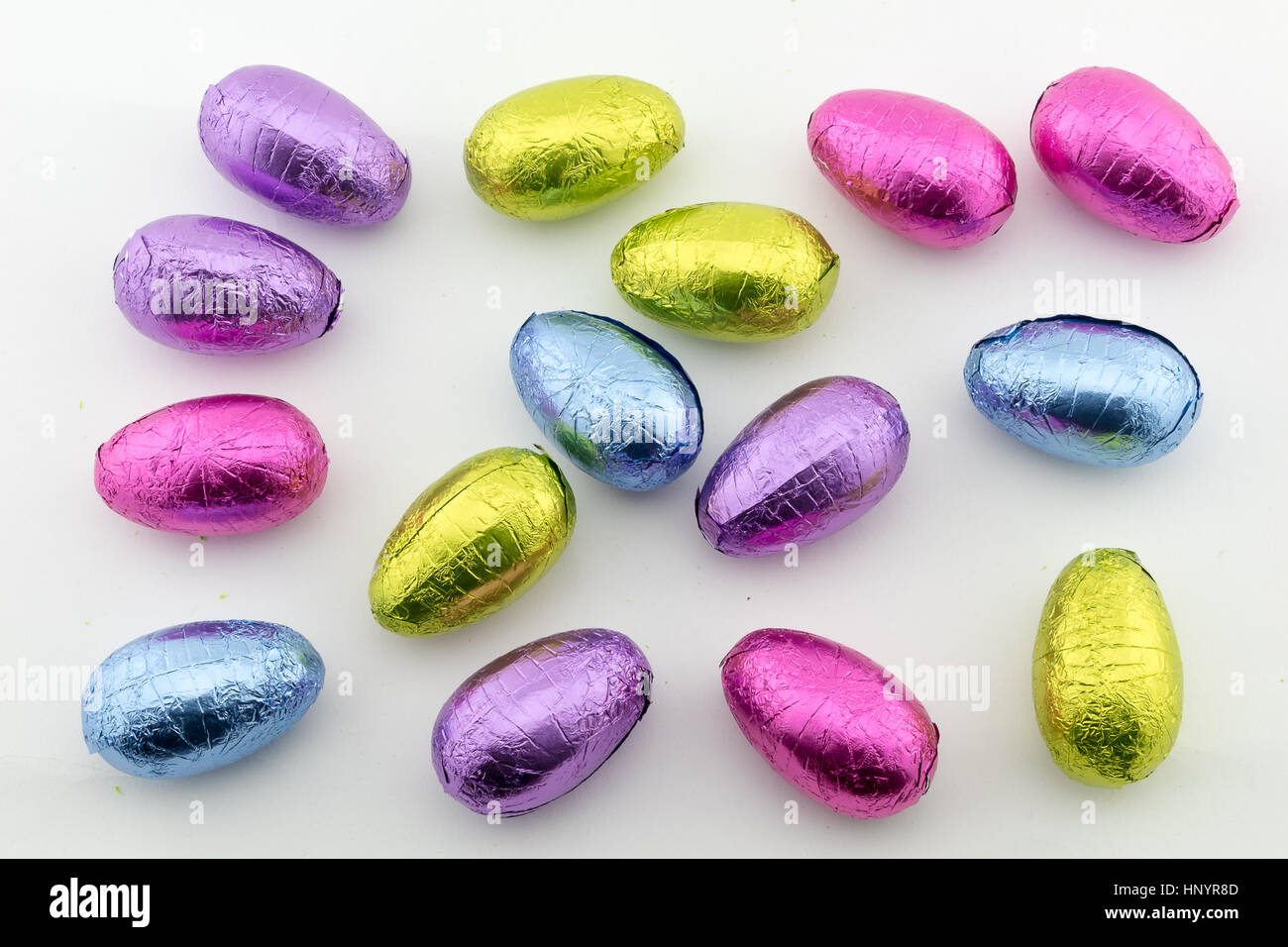 Multicoloured foil covered chocolate Easter eggs Stock Photo Alamy