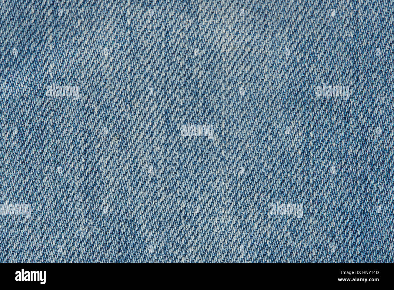 Blue jeans fabric background texture surface close up Stock Photo