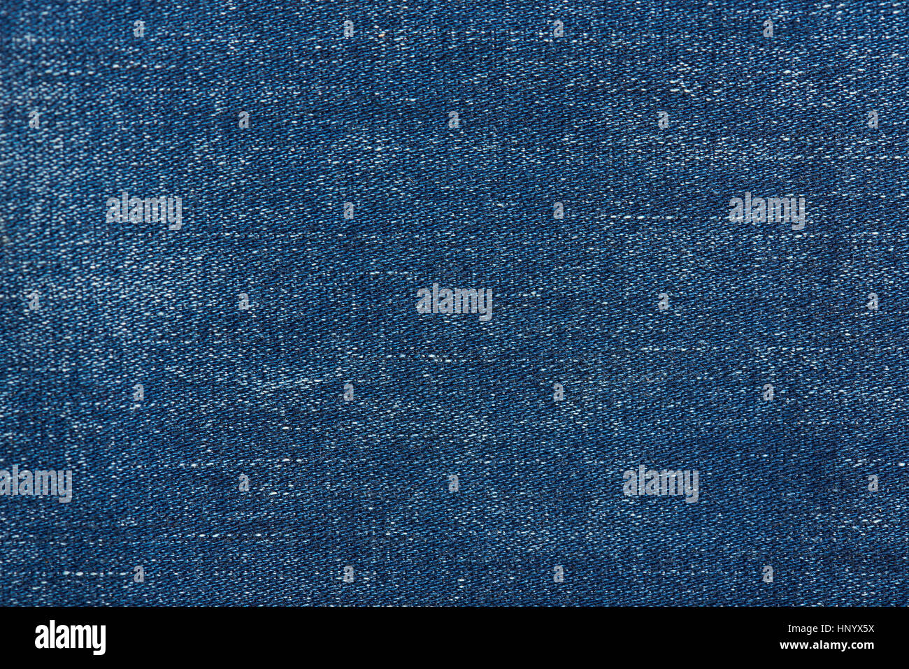 Dark blue jeans surface texture background close up Stock Photo