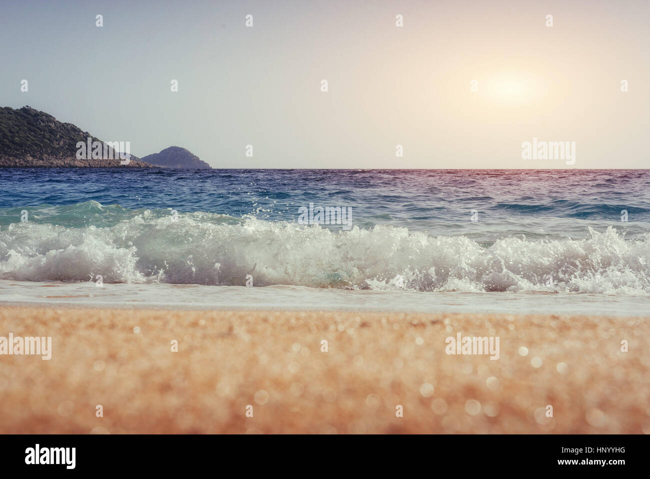 view of sandy beach and surf waves on the shore Stock Photo - Alamy