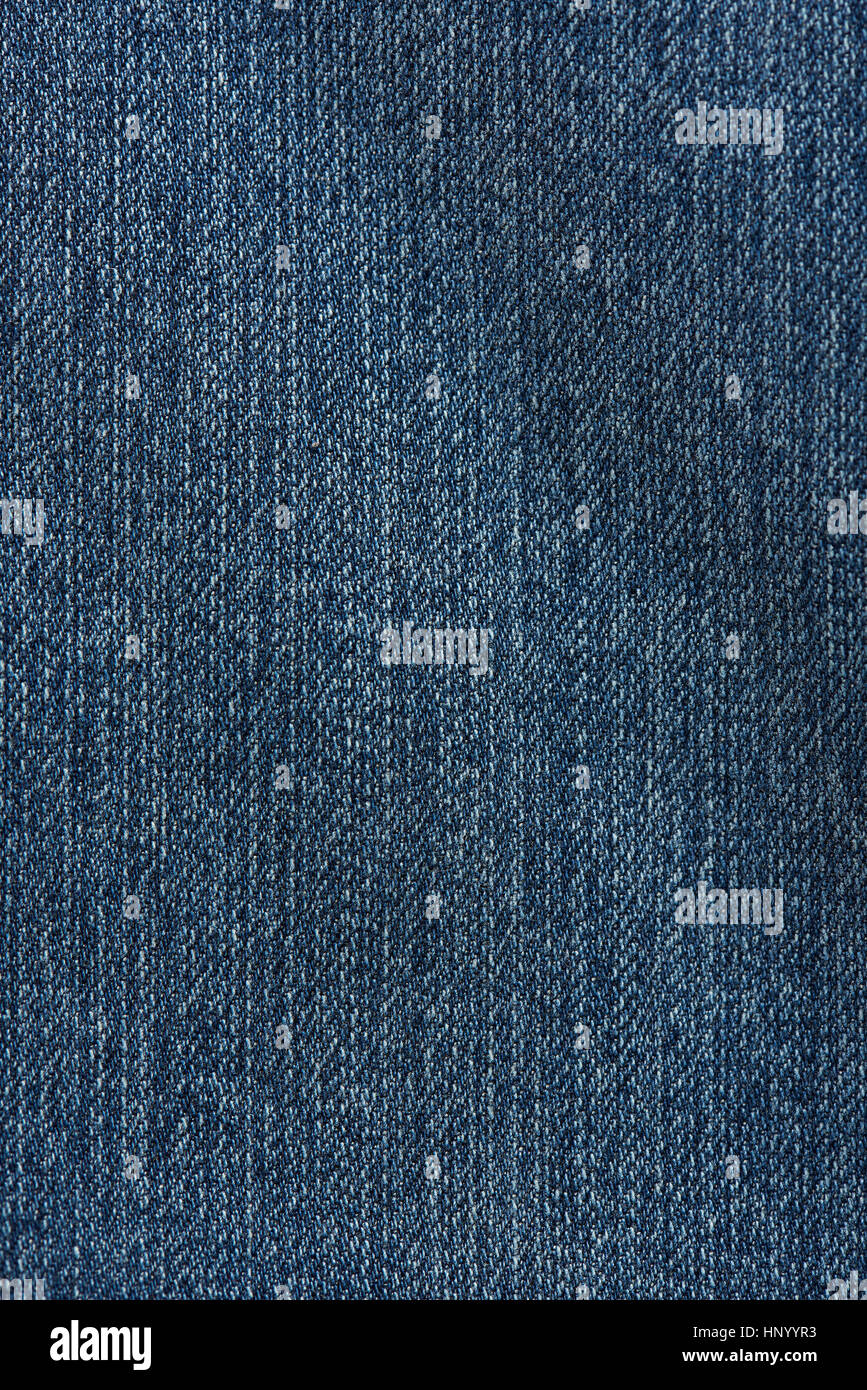 Dark blue jeans fabric texture background closeup Stock Photo