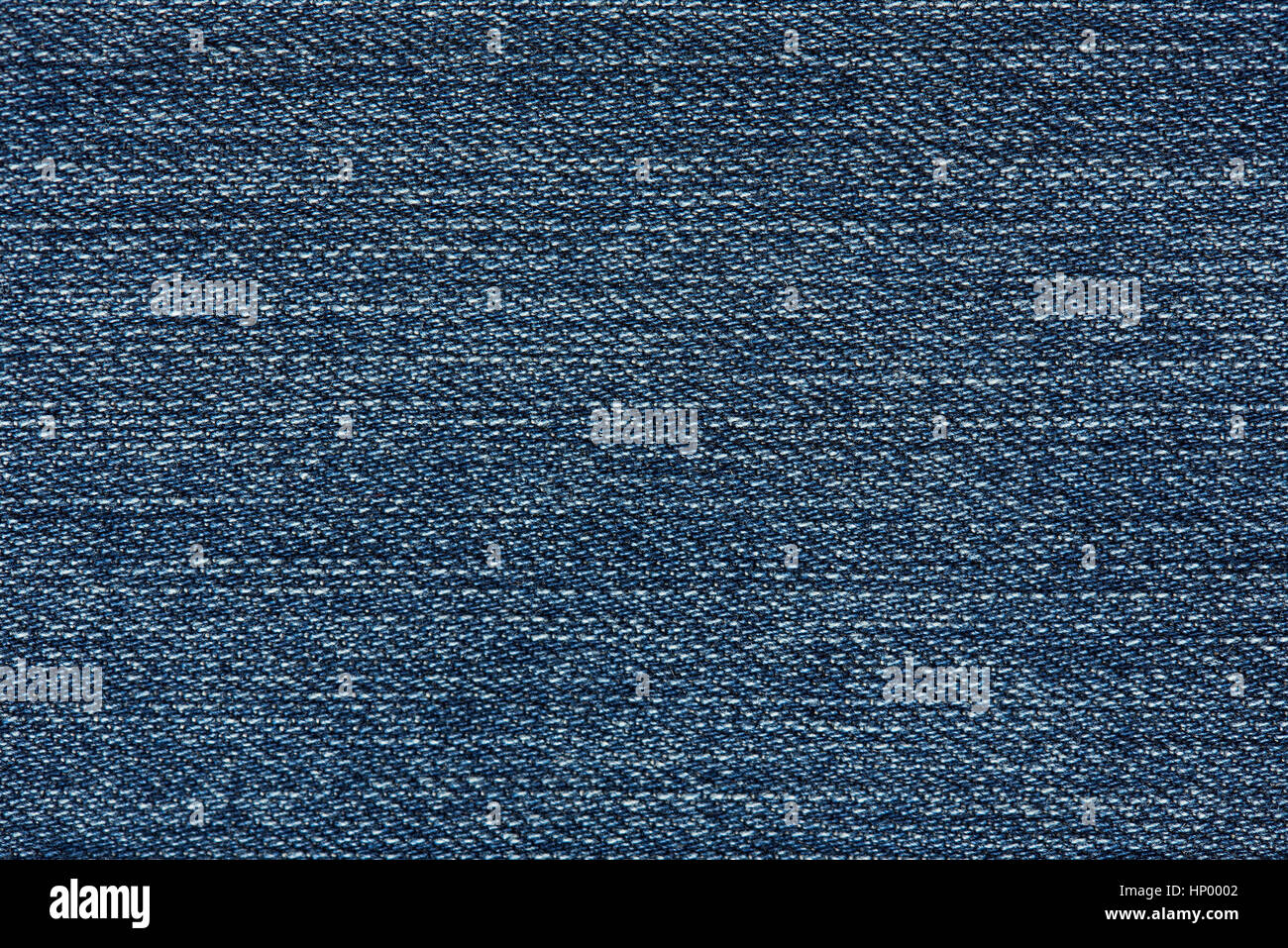 Horizontal dark blue jeans textile background close up Stock Photo