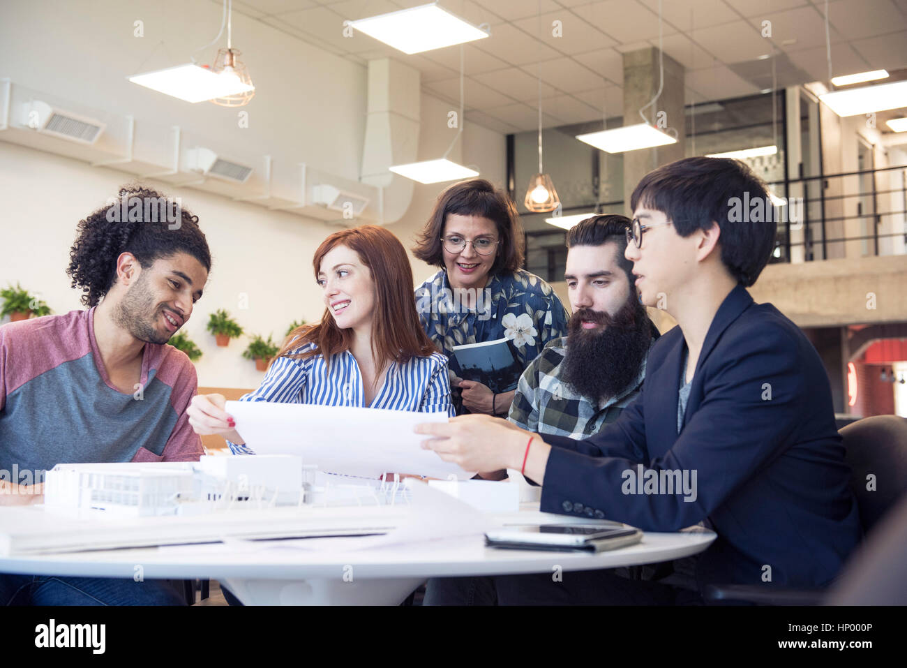 Working R Together Art People working together mentor hi-res stock photography and images - Alamy