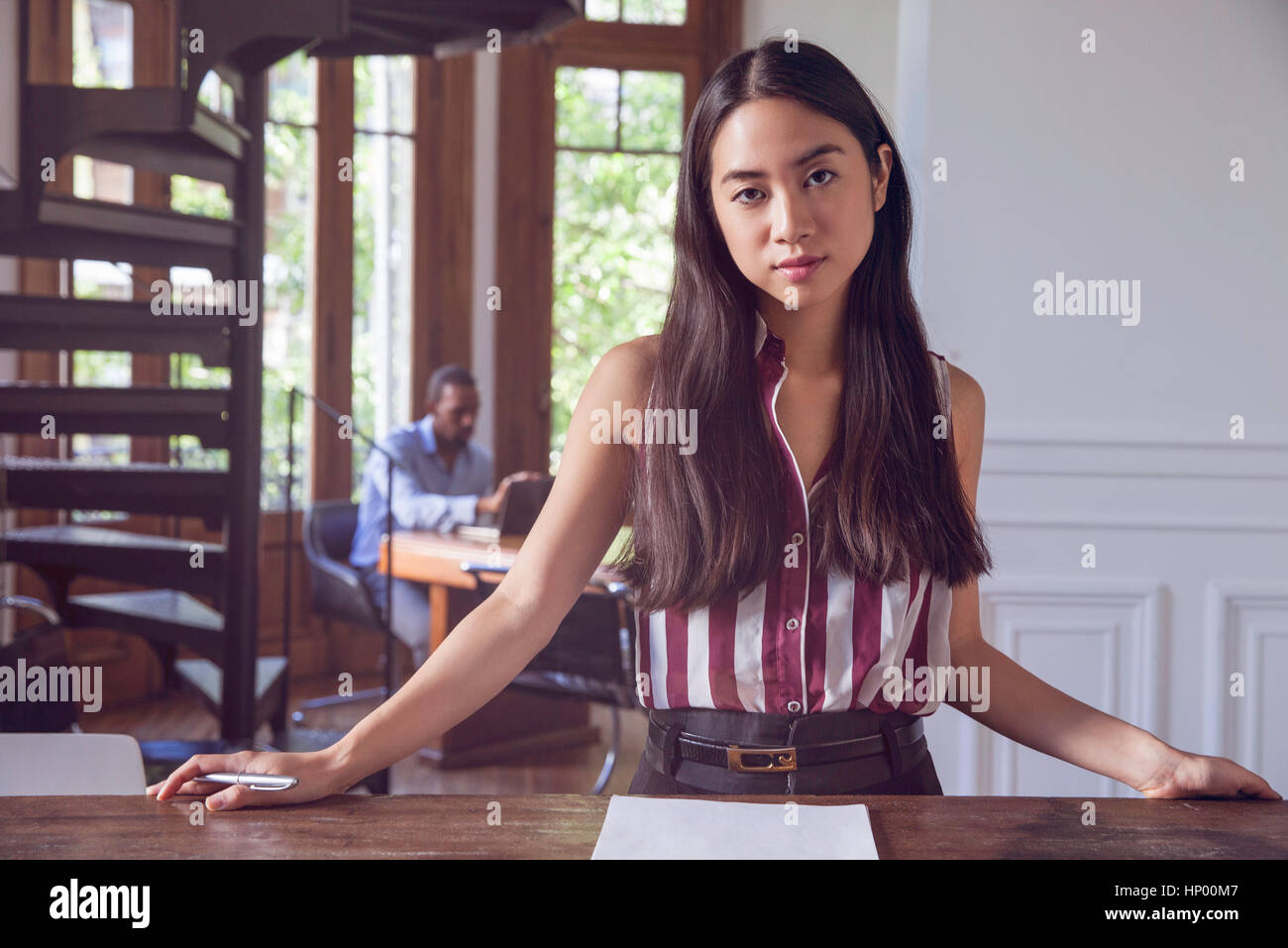 Young woman in office, portrait Stock Photo