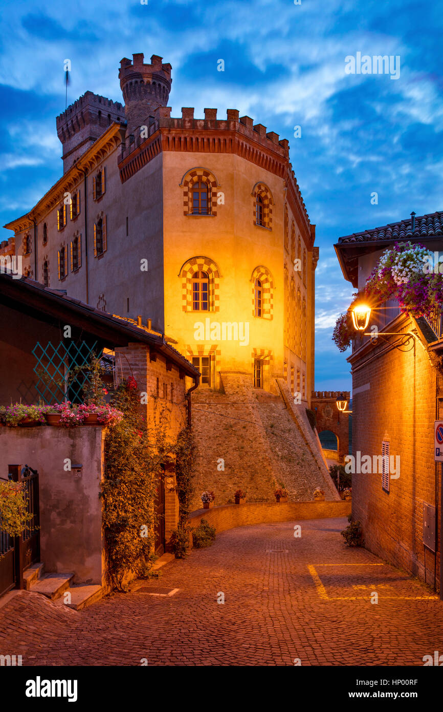 Twilight over medieval town of Barolo and Museo del Vino a Barolo, Langhe Region, Piemonte, Italy Stock Photo