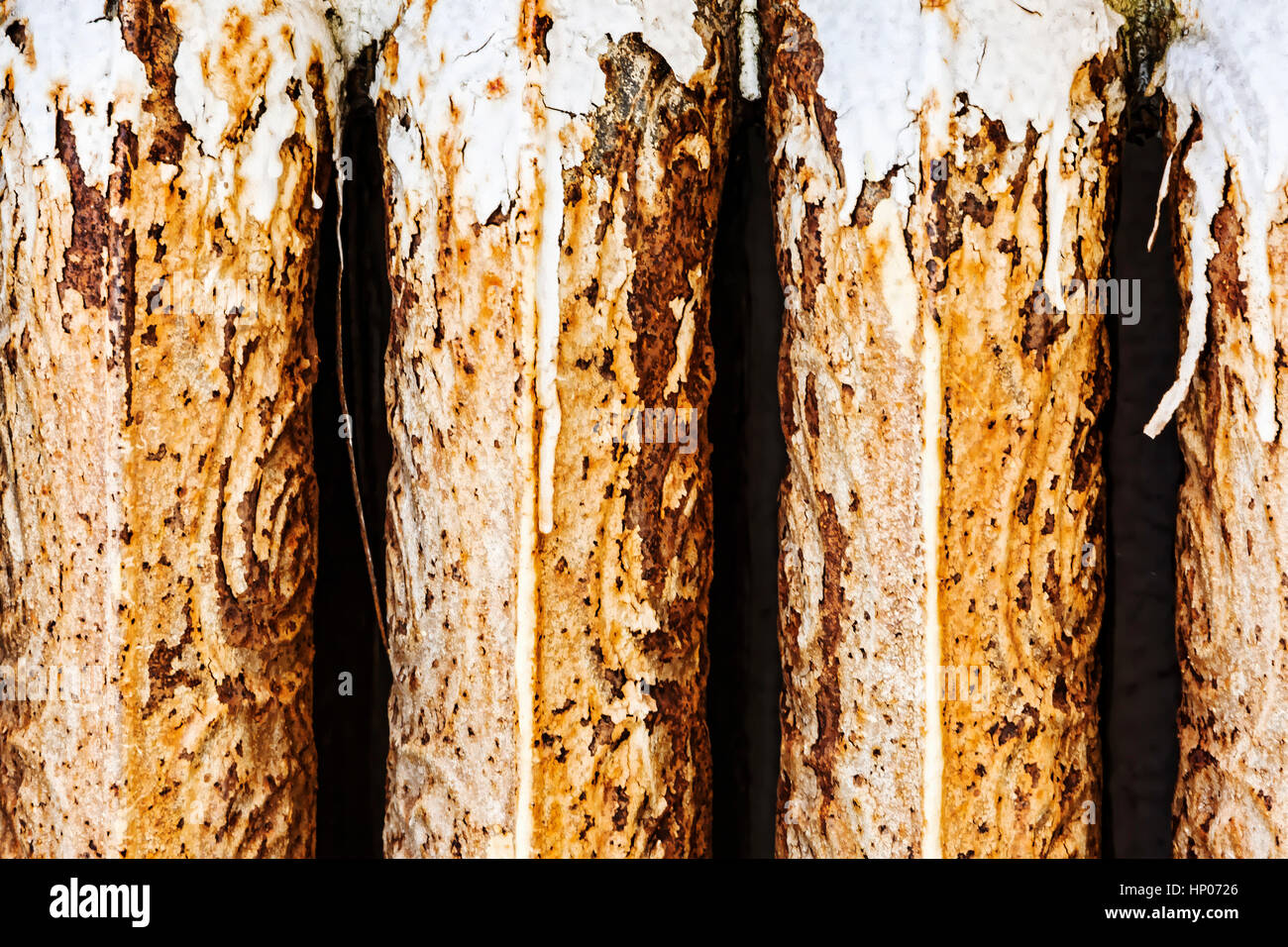 Top of old heating radiator in salvage yard coated with age, paint, and ...