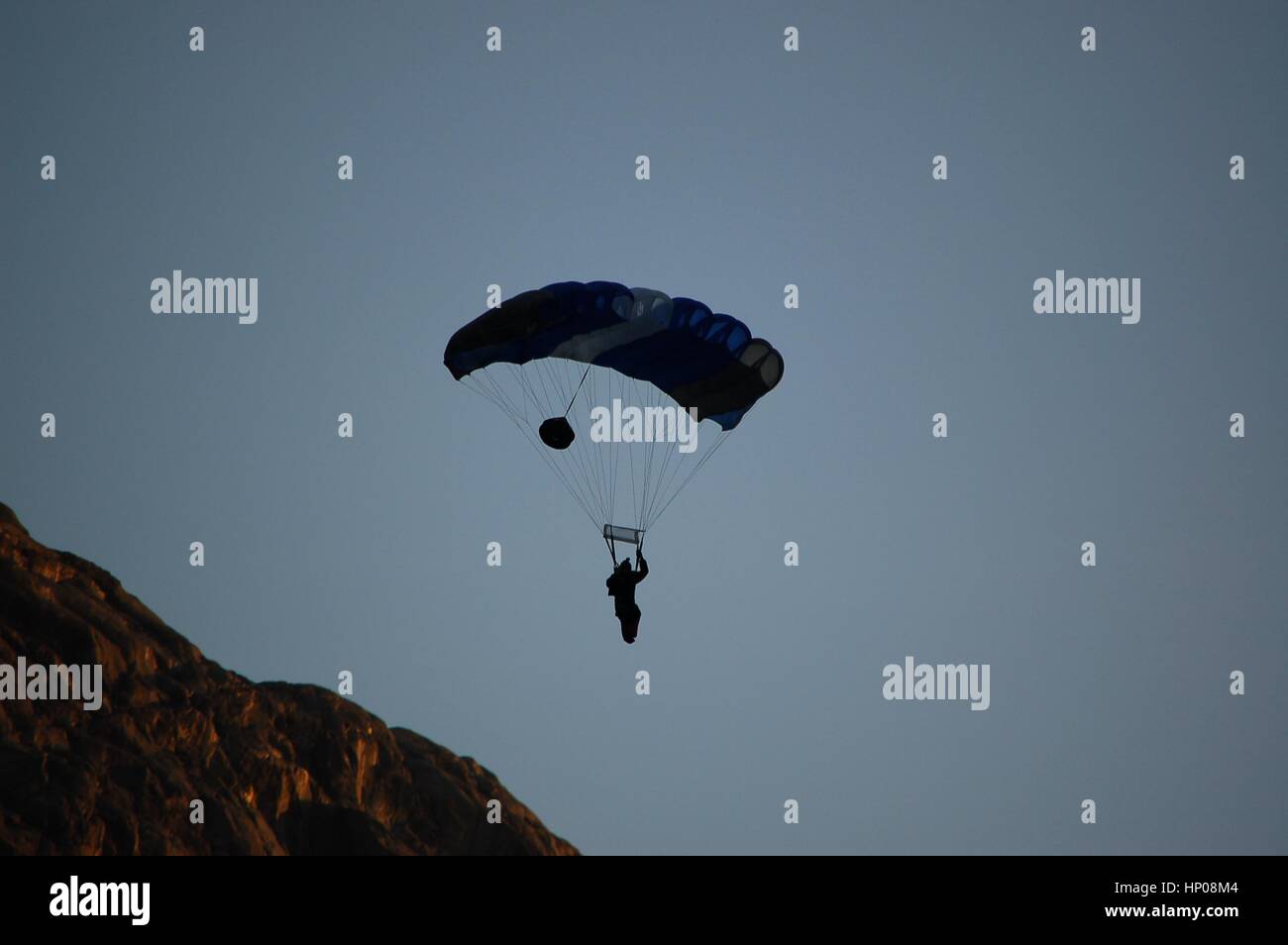 BASE jumpers launching themselves off of the cliffs of Kjerag in