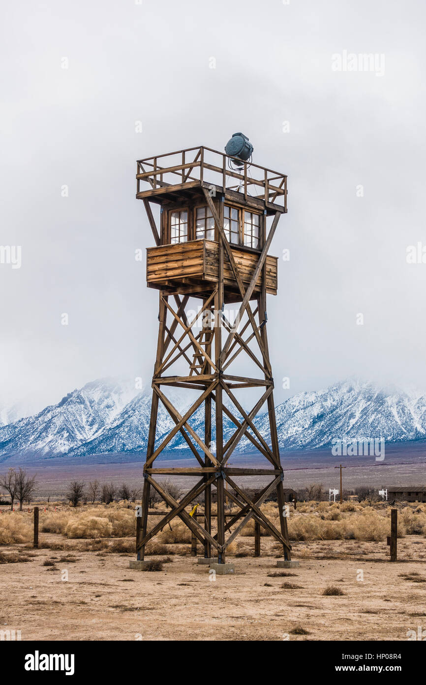 Old, abandoned, wooden guard tower, at the World War II Manzanar Japanese internment camp in the Mojave Desert, Southern California. Stock Photo