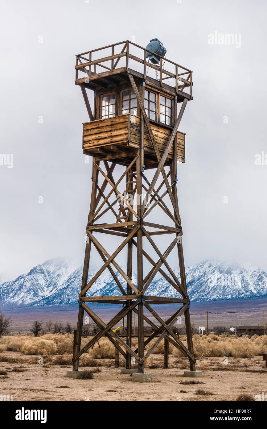 Old, abandoned, wooden guard tower, at the World War II Manzanar Japanese internment camp in the Mojave Desert, Southern California. Stock Photo