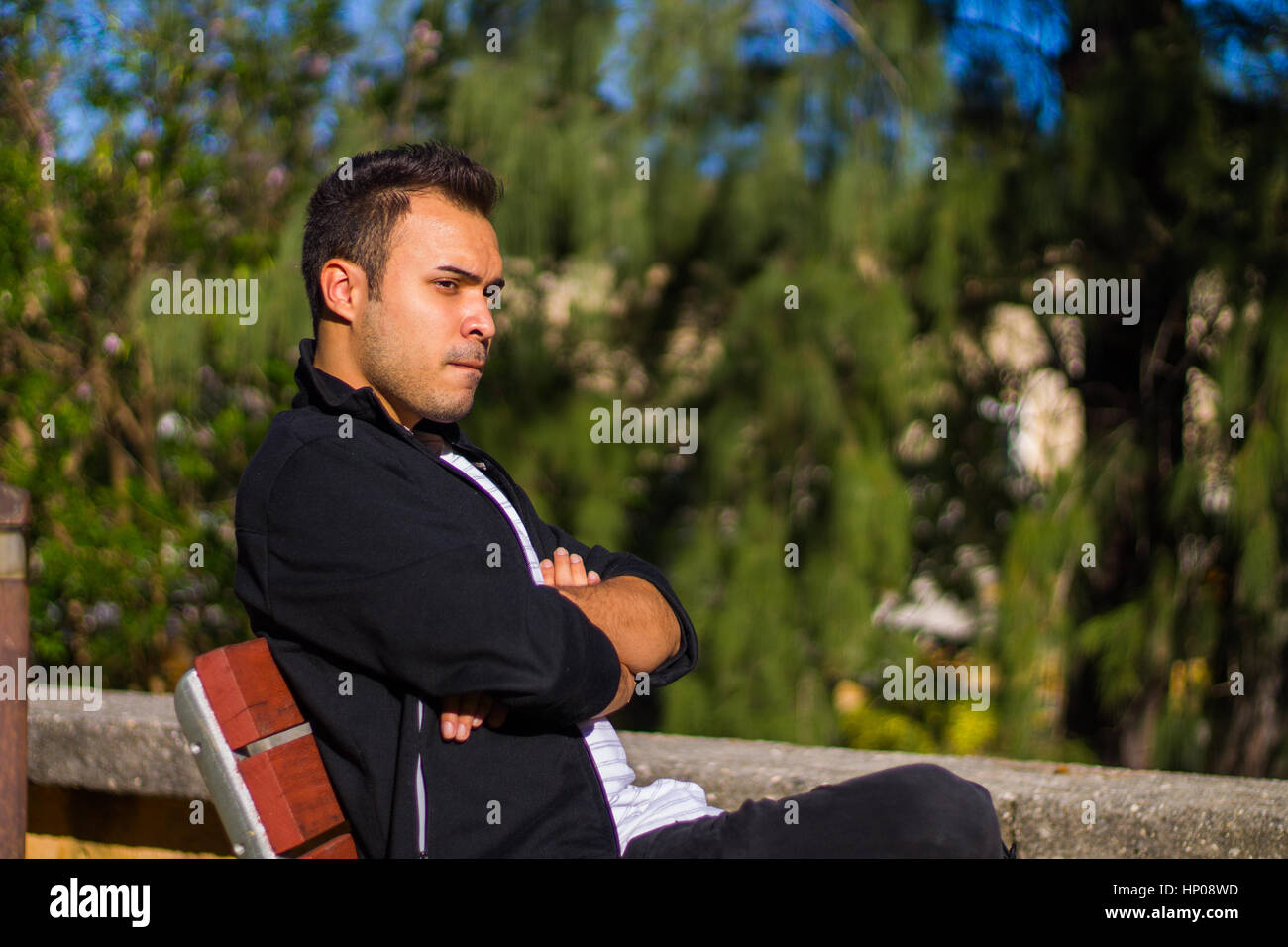 Guy at a park Stock Photo