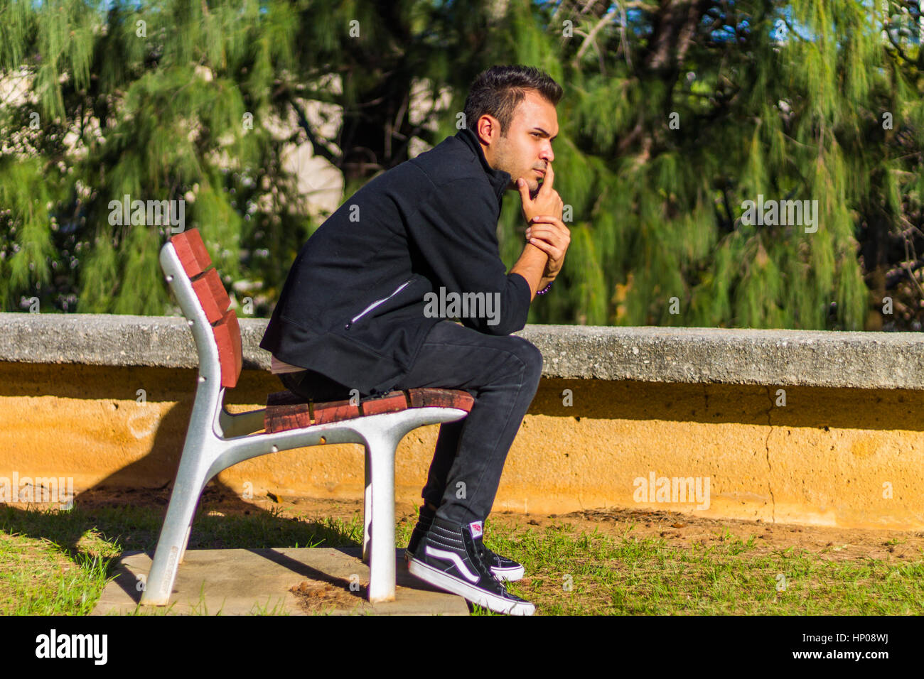 Guy at a park Stock Photo