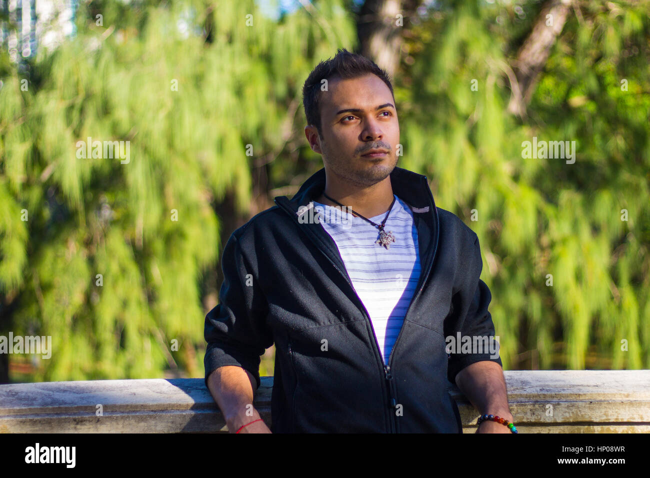 Guy at a park Stock Photo