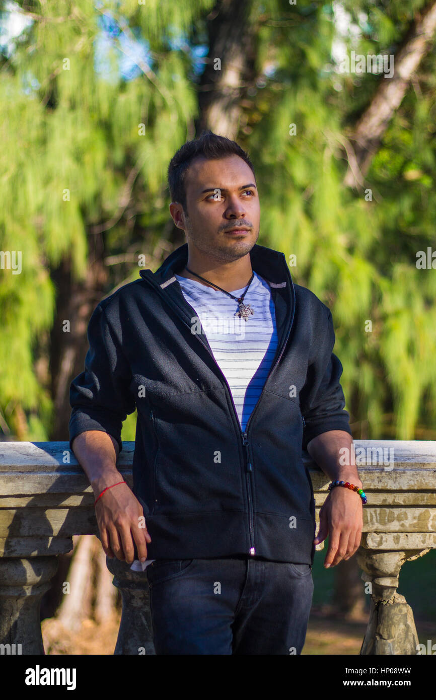 Guy at a park Stock Photo